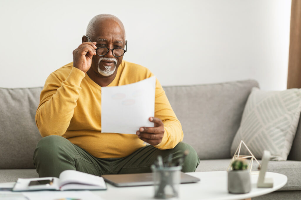 man reading about disability denial signs